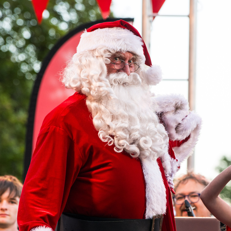 Santa in a red suit and long white beard